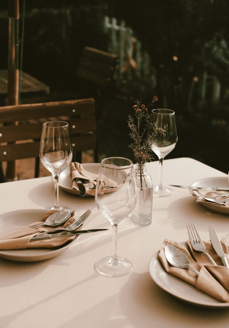 An elegant outdoor wedding table setting